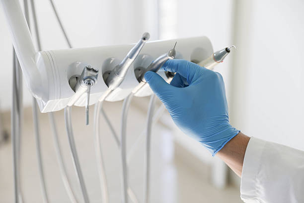 Professional Root Canal Treatment technician working in Bayport, NY